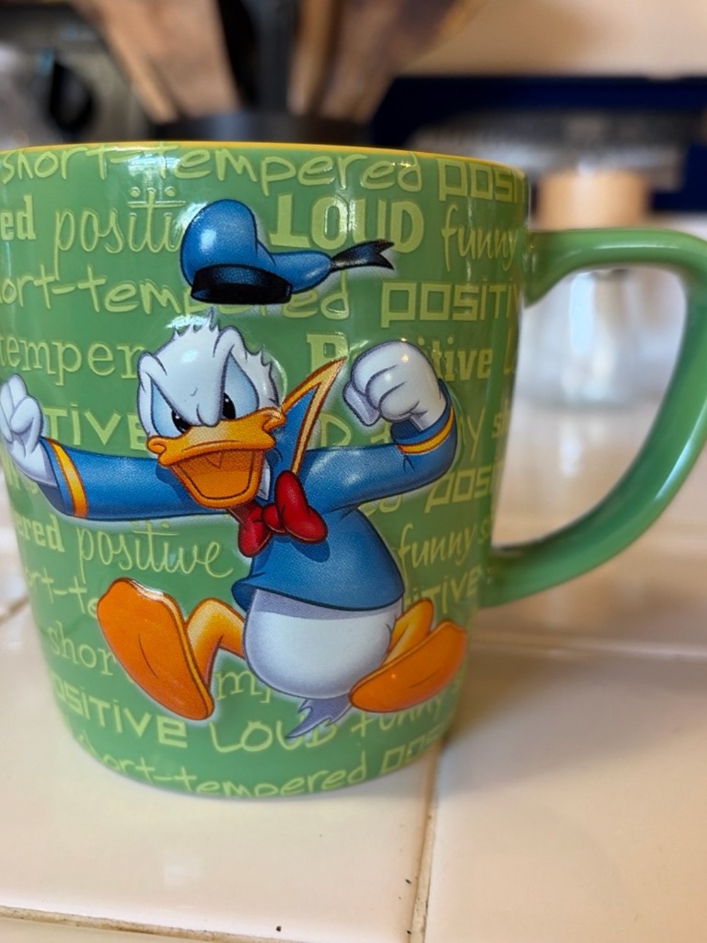 Disney Donald Duck Green Ceramic Mug with Blue, Orange, Red Accents